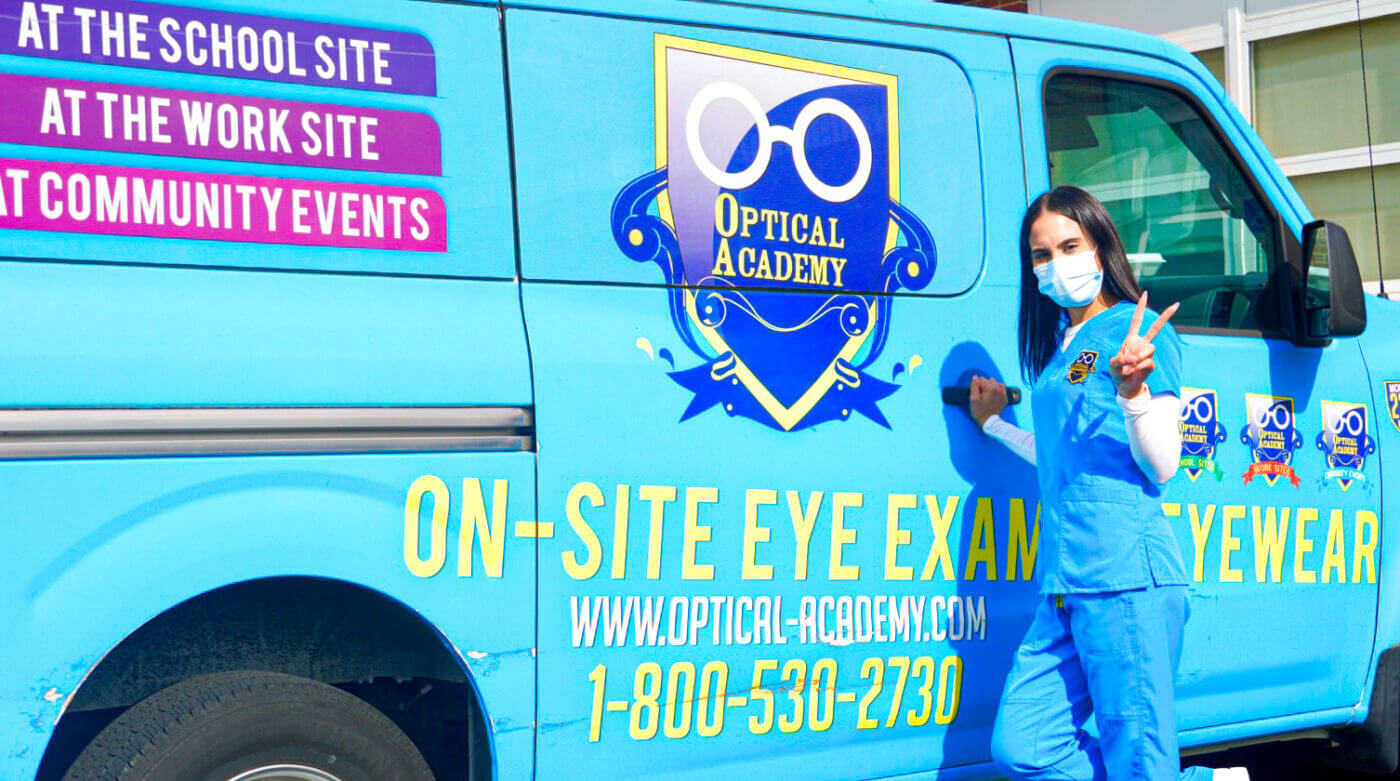Optical Academy van and team at a school