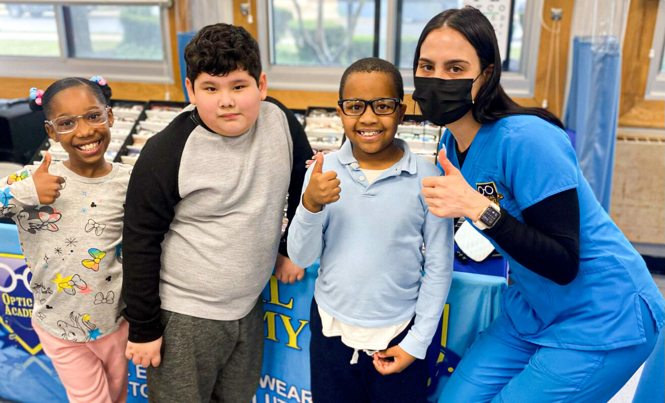 Optical Academy school vision screening with students
