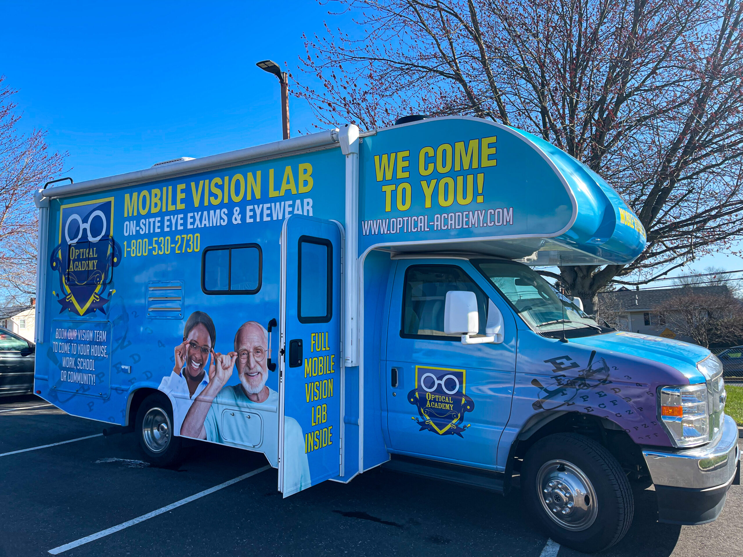 Optical Academy mobile vision care van and team